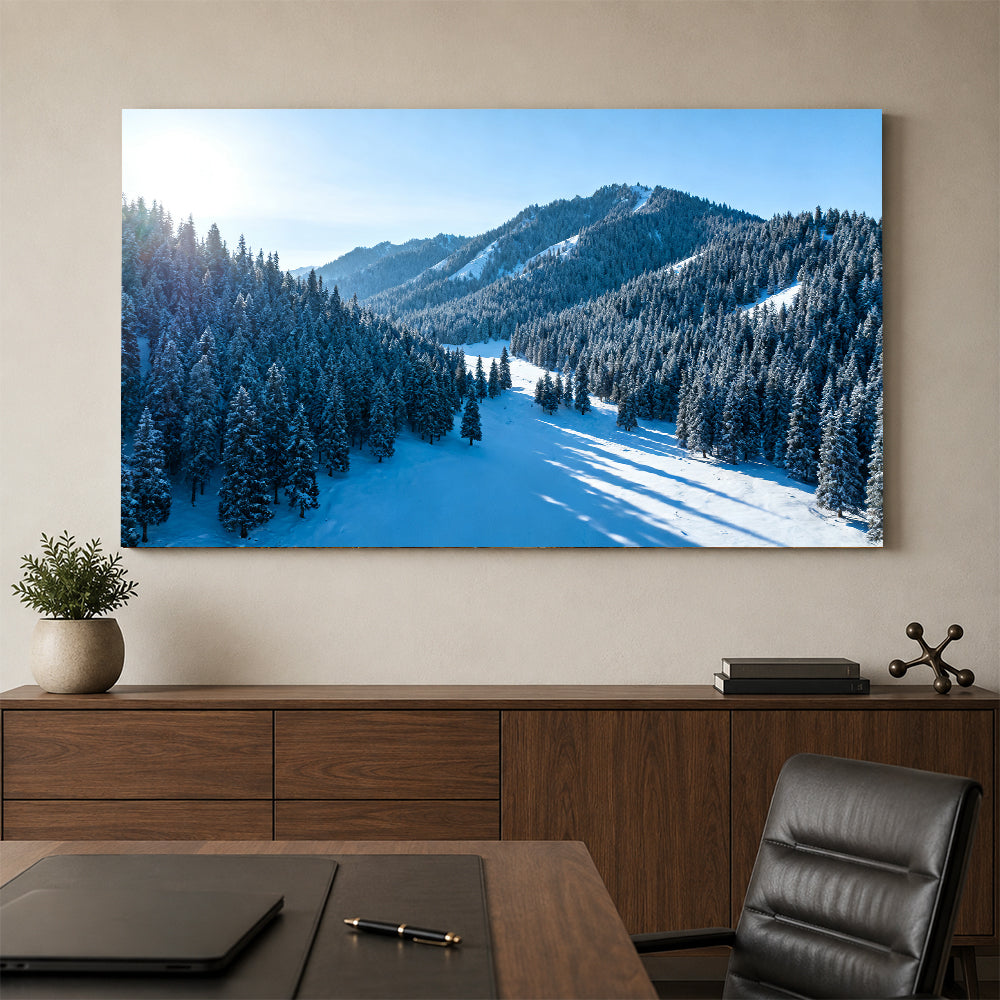 Snowy Woodland Valley canvas wall art, office mockup above a desk.