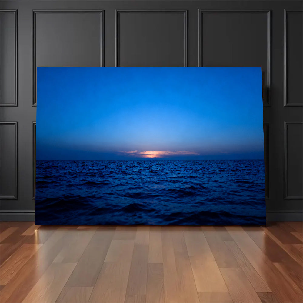 Last Light at Sea canvas wall art, floor display against a dark wall.