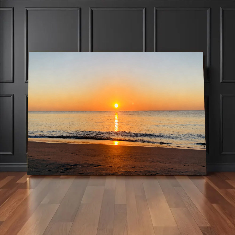 Golden Ocean Sunrise canvas wall art, floor display against a dark wall.