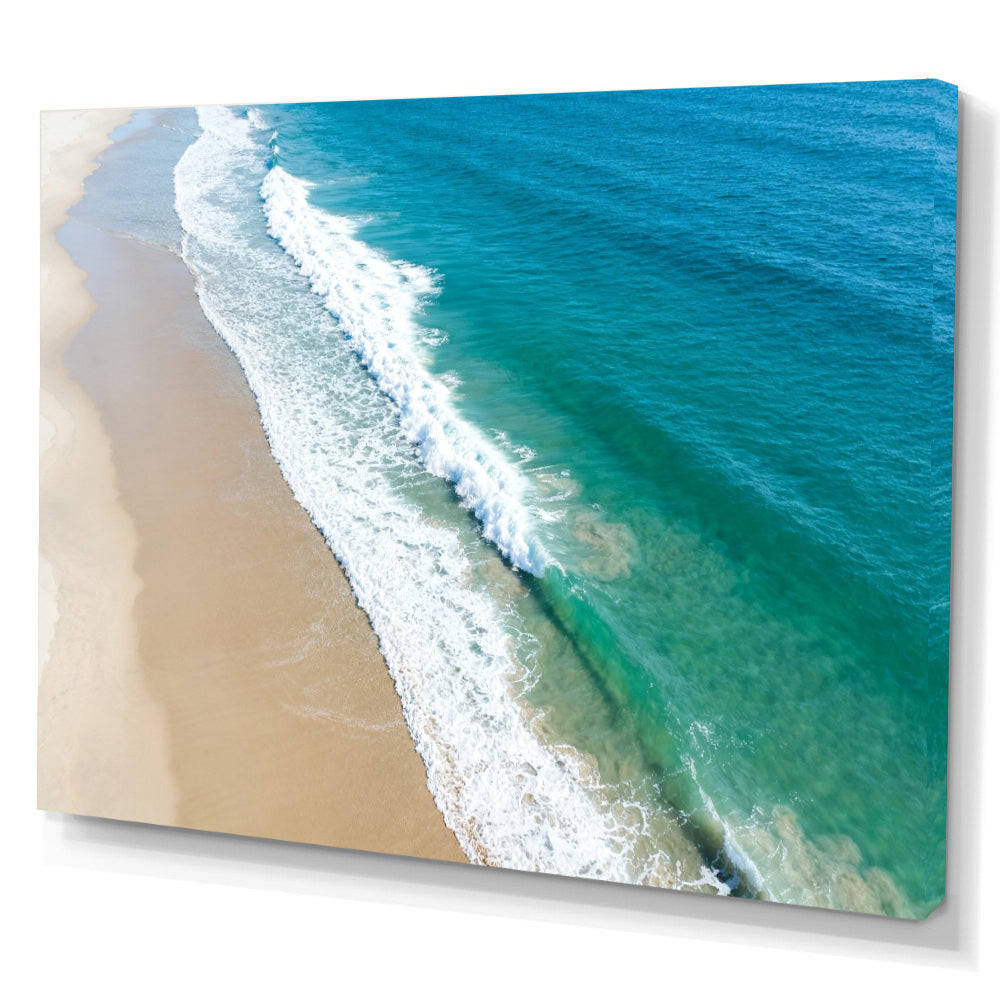 Aerial Sand and Surf canvas wall art, angled canvas mockup on a white background.