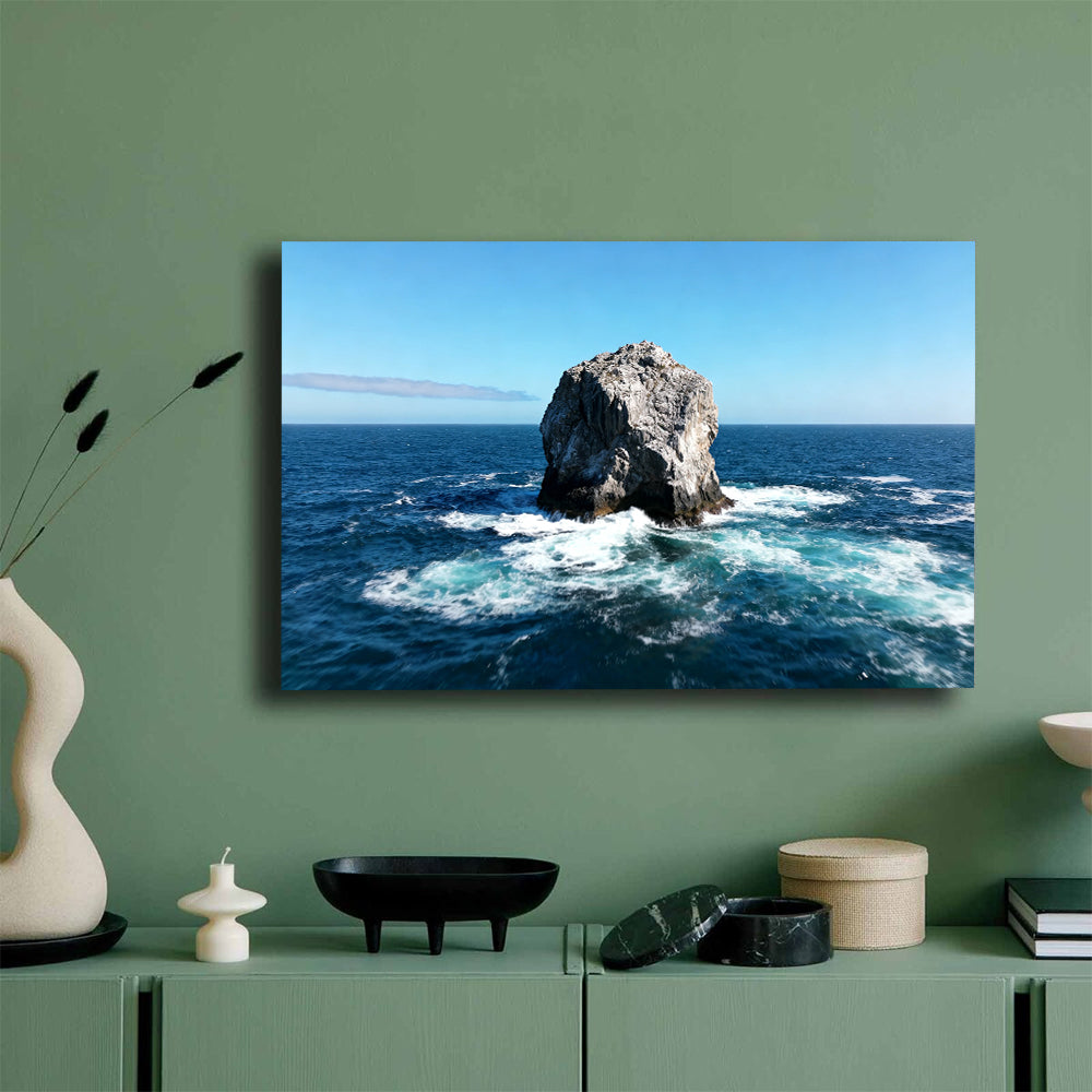Solitary Sea Stack canvas wall art, mockup on a green wall.