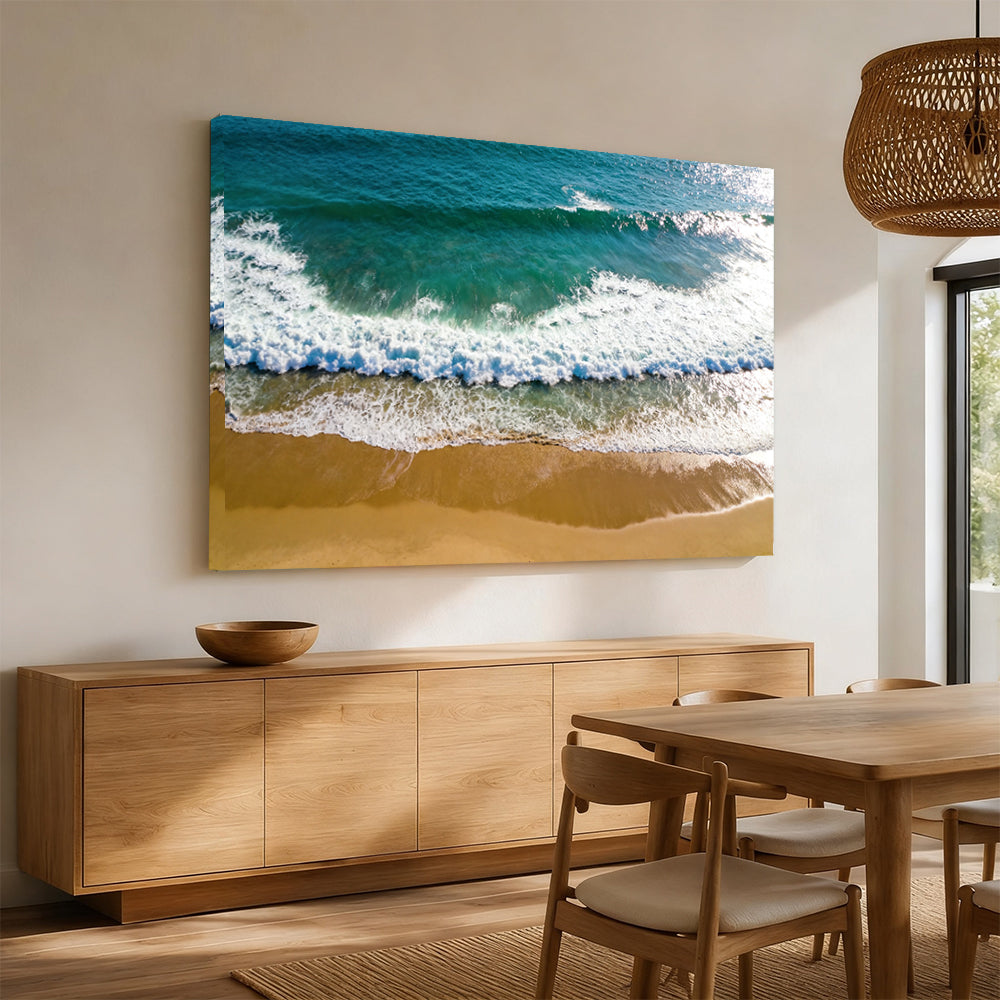 Emerald Wave from Above canvas wall art, angled mockup above a sideboard.