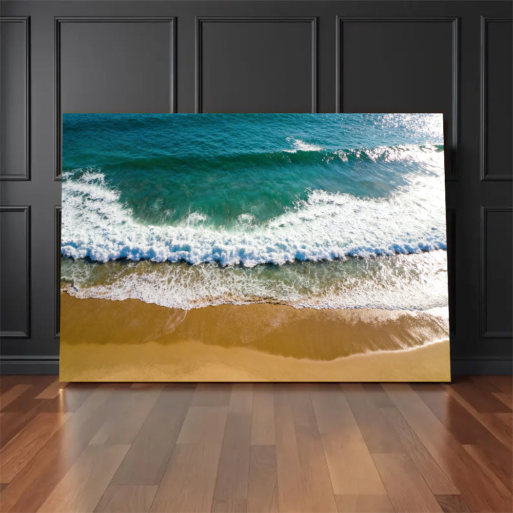 Emerald Wave from Above canvas wall art, floor display against a dark wall.