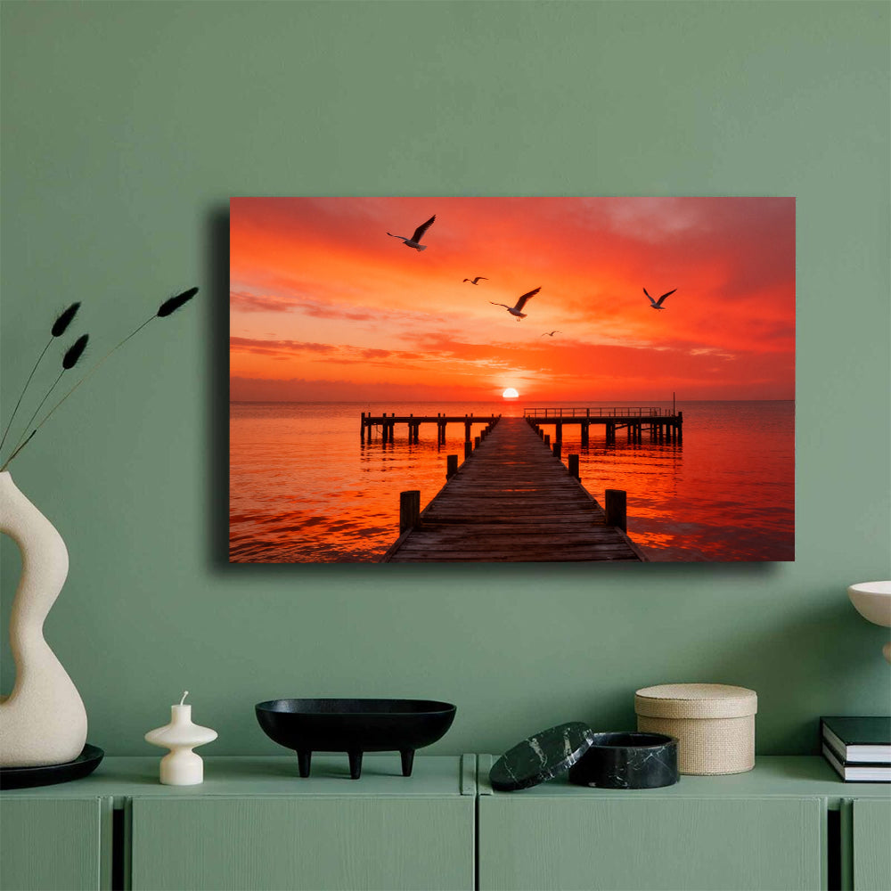 Seabirds over Crimson Pier canvas wall art, mockup on a green wall.
