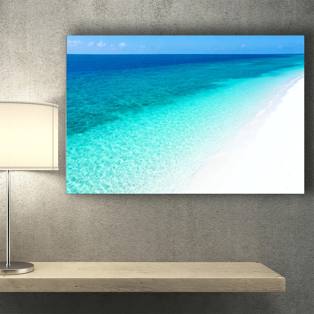 Clear Blue Sandbank canvas wall art, wall mockup above a console.