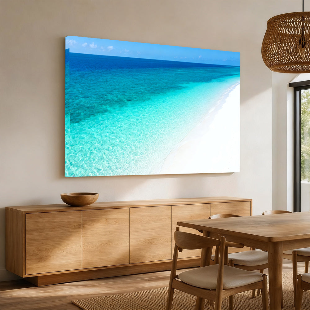 Clear Blue Sandbank canvas wall art, angled mockup above a sideboard.