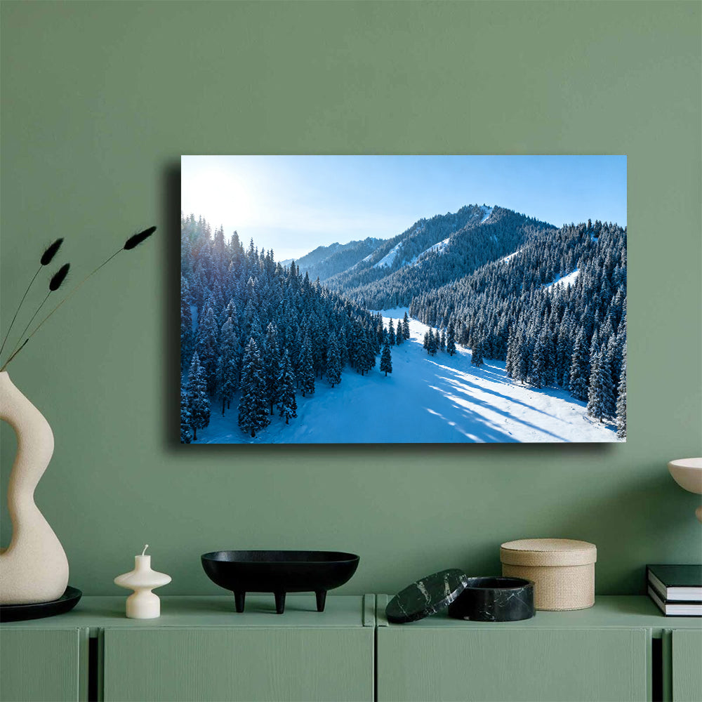 Snowy Woodland Valley canvas wall art, mockup on a green wall.