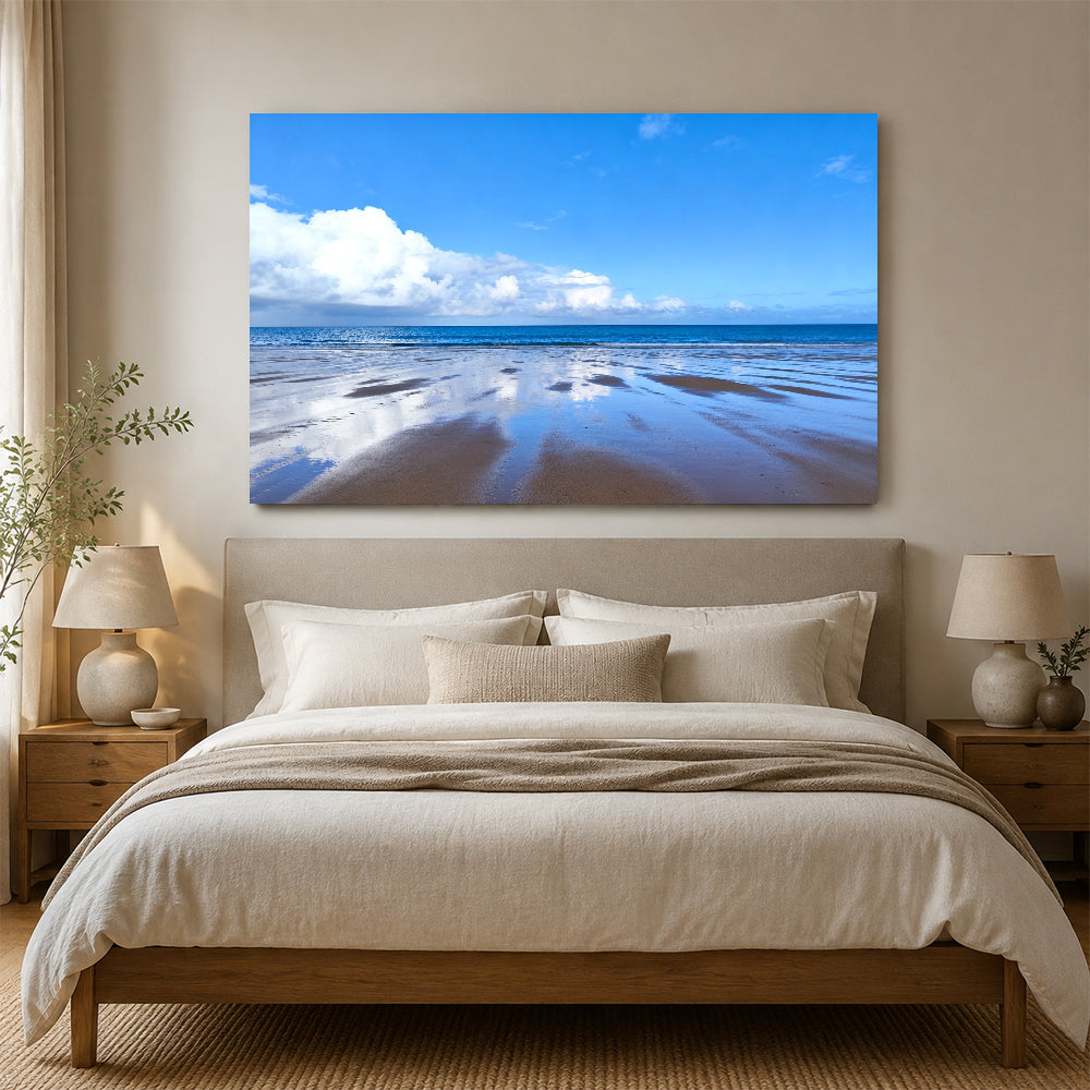 Blue Sky Tidal Flats canvas wall art, bedroom mockup above a bed.