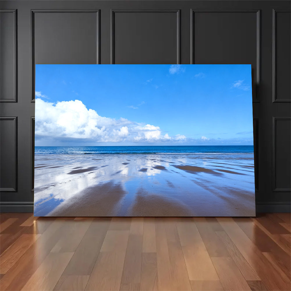 Blue Sky Tidal Flats canvas wall art, floor display against a dark wall.