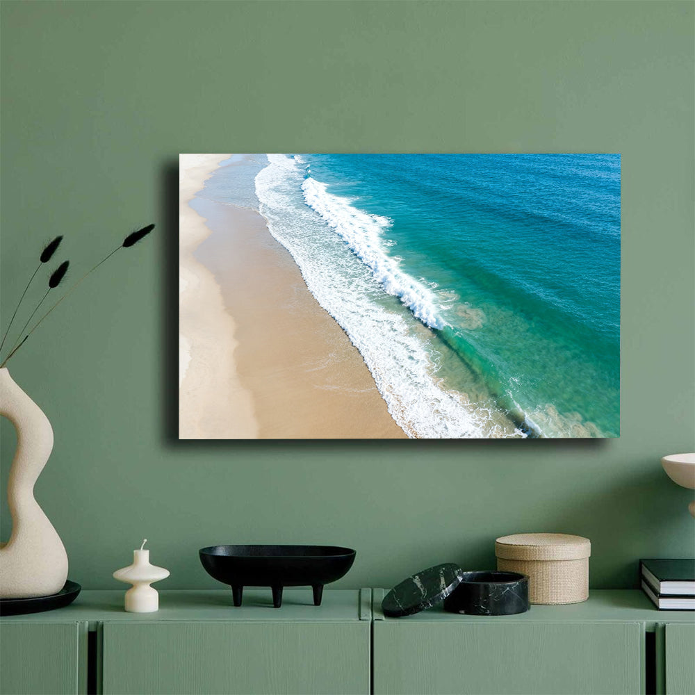 Aerial Sand and Surf canvas wall art, mockup on a green wall.