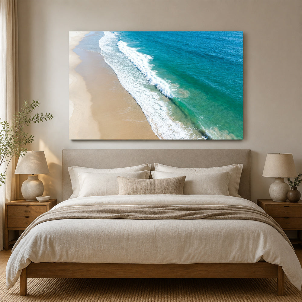 Aerial Sand and Surf canvas wall art, bedroom mockup above a bed.