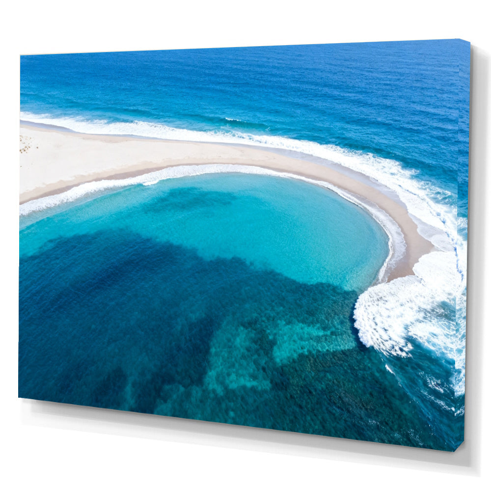 Turquoise Sandbar Arc canvas wall art, angled canvas mockup on a white background.