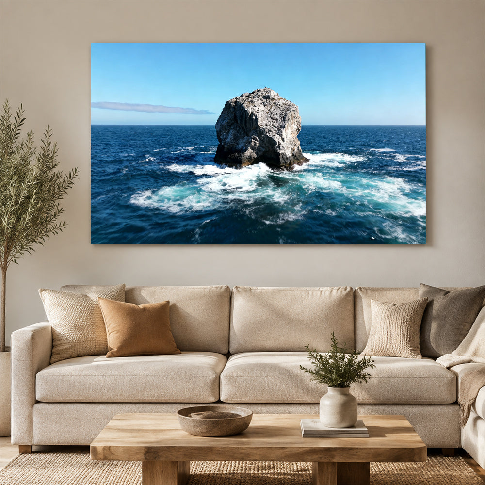 Solitary Sea Stack canvas wall art, living room mockup above a sofa.