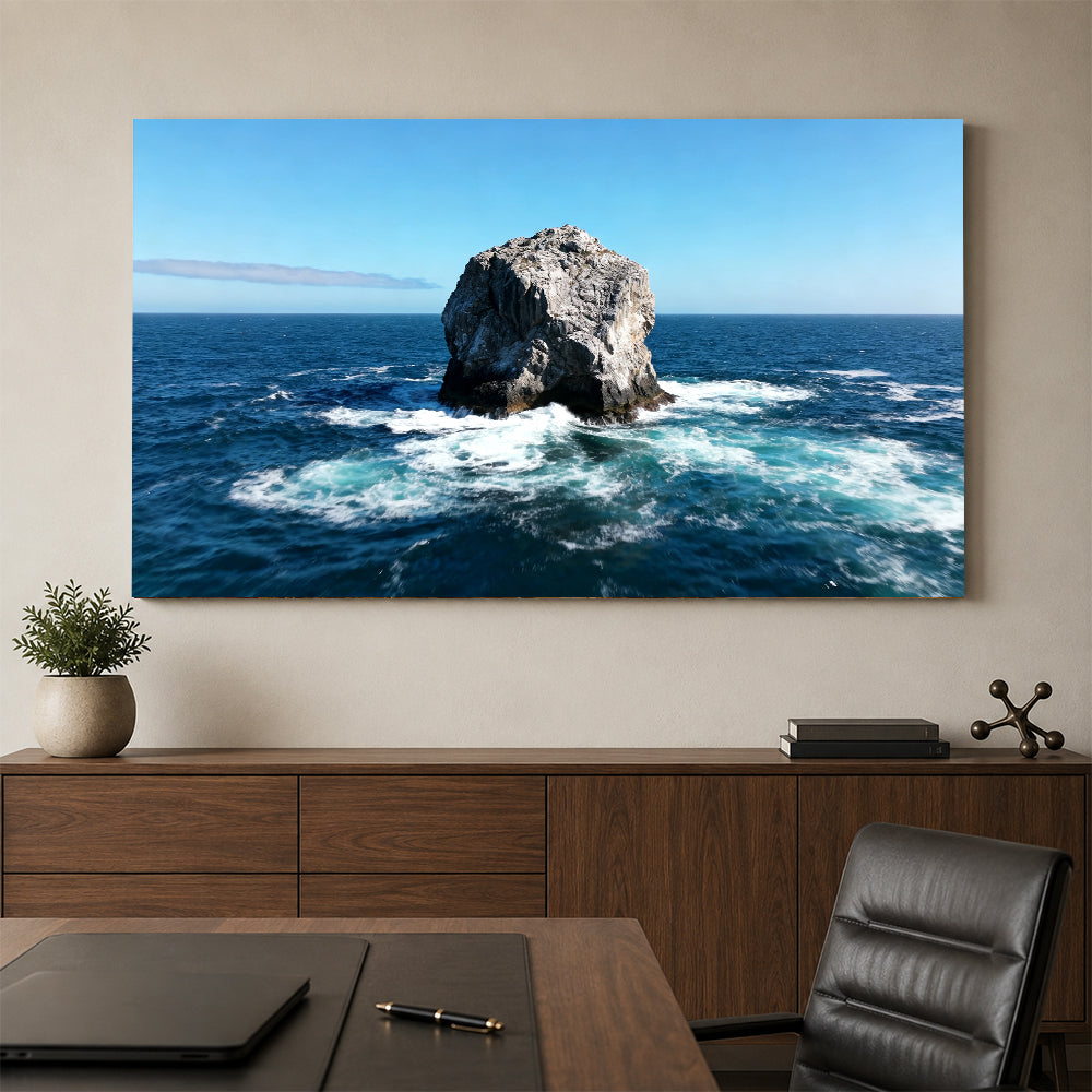 Solitary Sea Stack canvas wall art, office mockup above a desk.