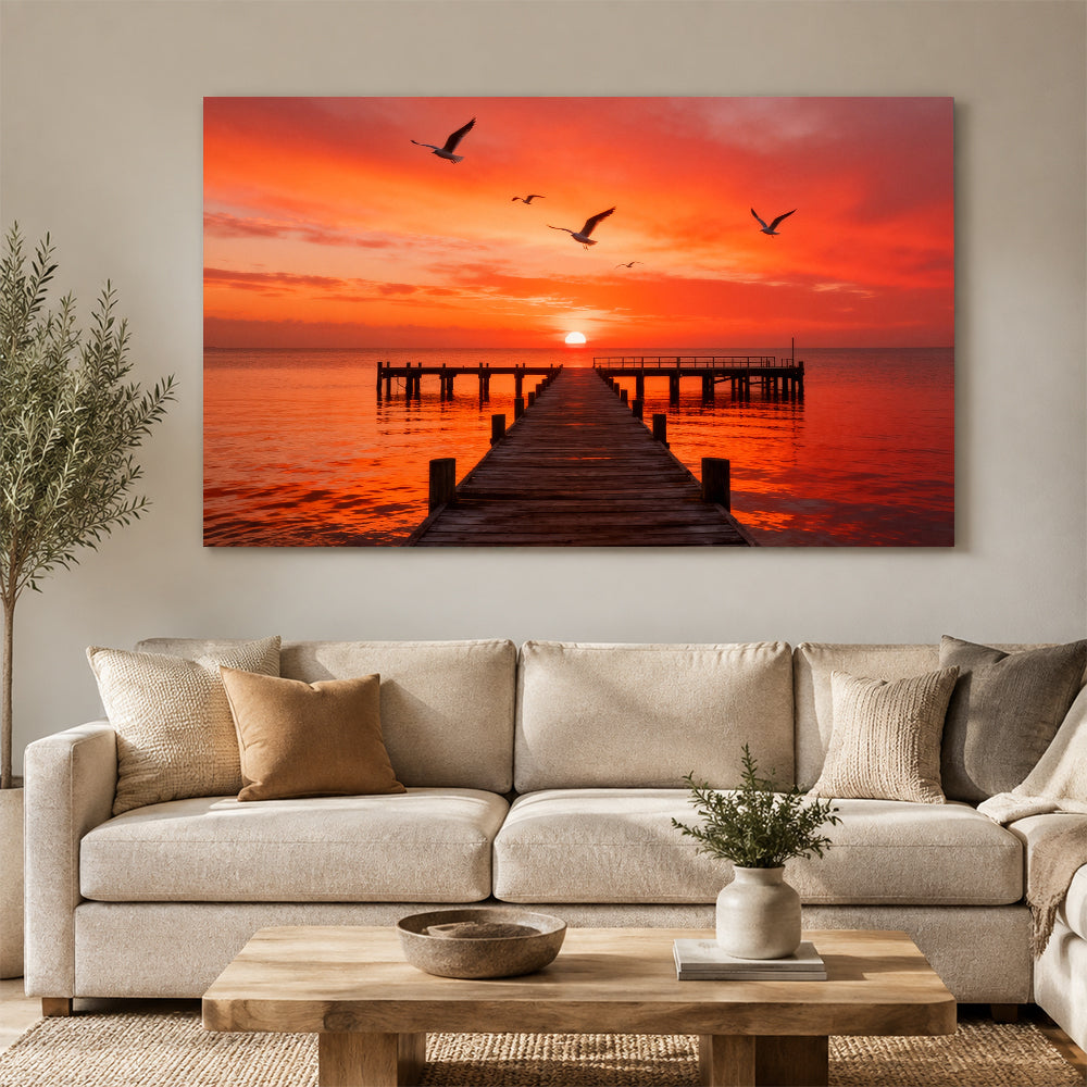 Seabirds over Crimson Pier canvas wall art, living room mockup above a sofa.