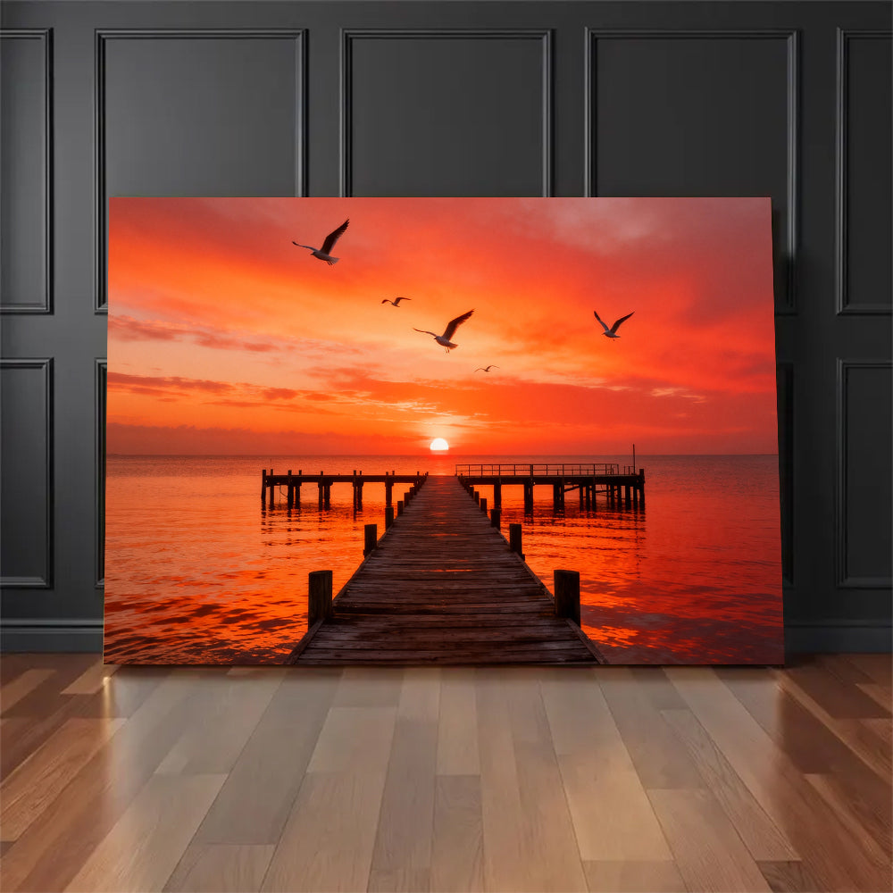 Seabirds over Crimson Pier canvas wall art, floor display against a dark wall.