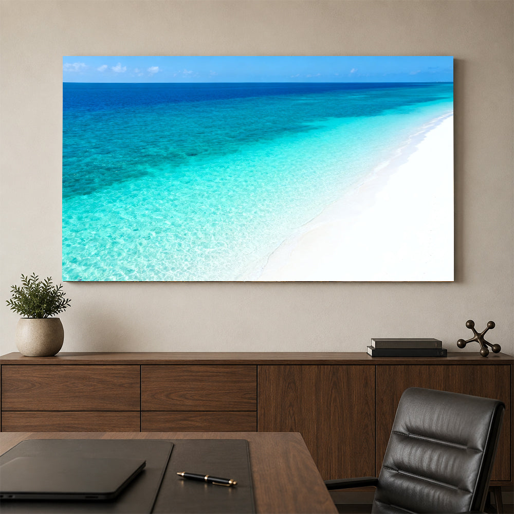 Clear Blue Sandbank canvas wall art, office mockup above a desk.