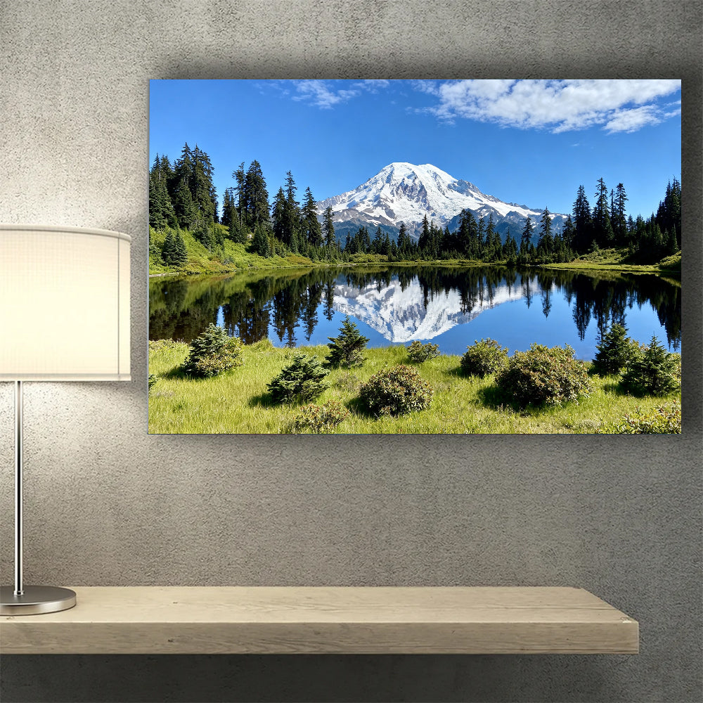 Snowy Summit and Green Shore canvas wall art, desk mockup.