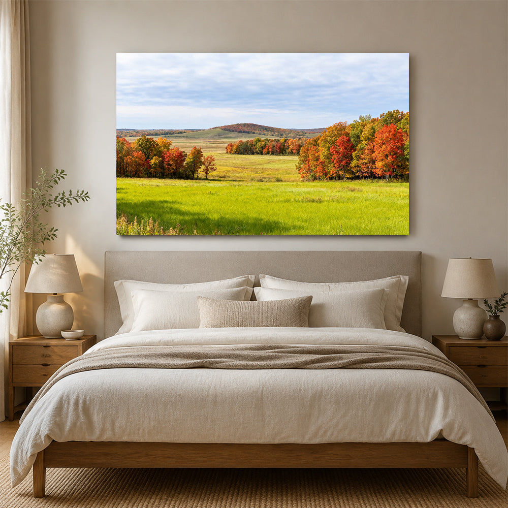 Autumn Trees across Green Fields canvas wall art, bedroom mockup.