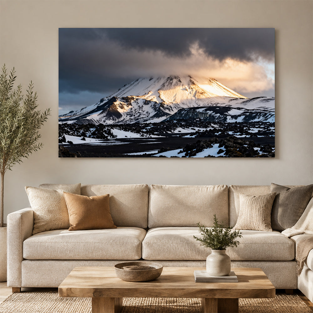 Stormlight on a Snowy Volcano canvas wall art, living room mockup.