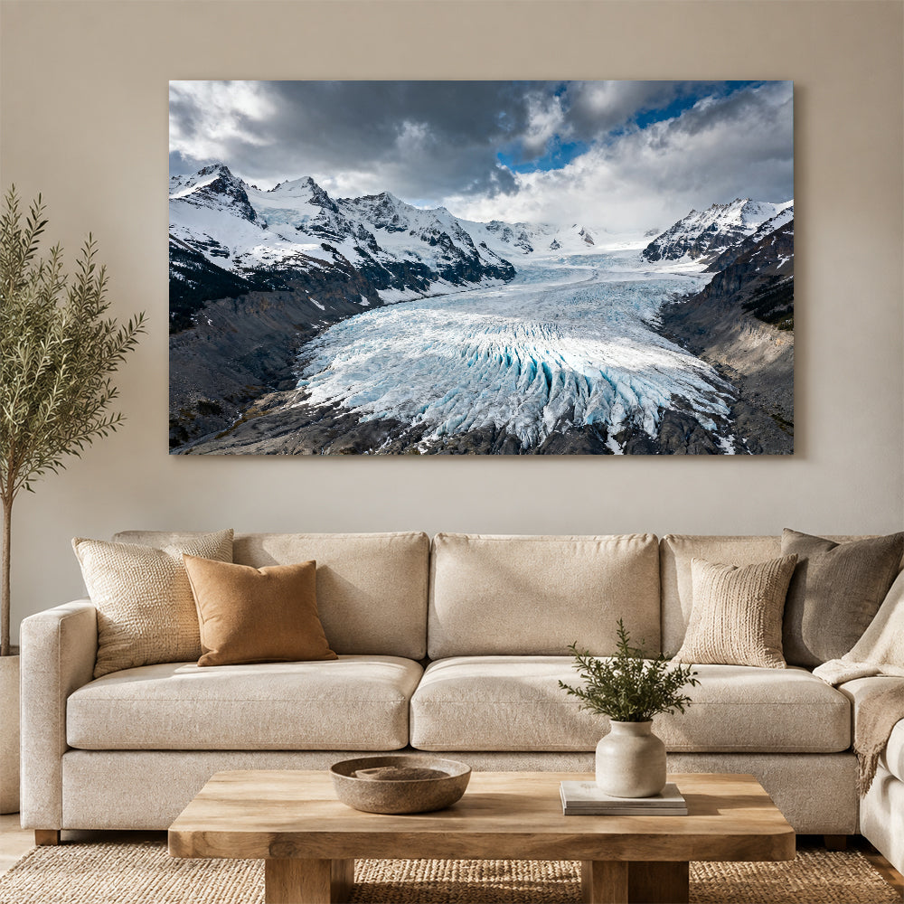 Icefall beneath Storm Clouds canvas wall art, living room mockup.