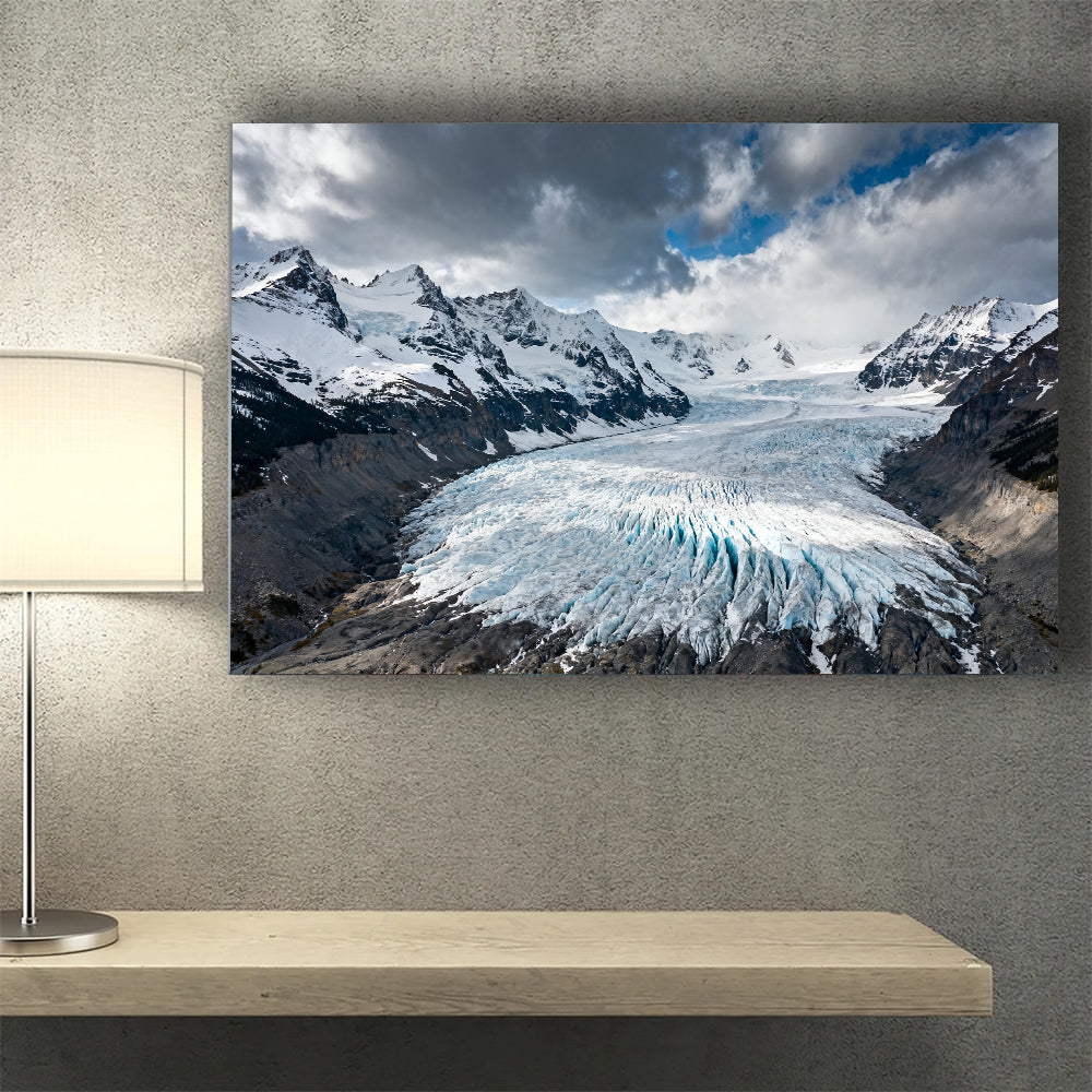 Icefall beneath Storm Clouds canvas wall art, desk mockup.