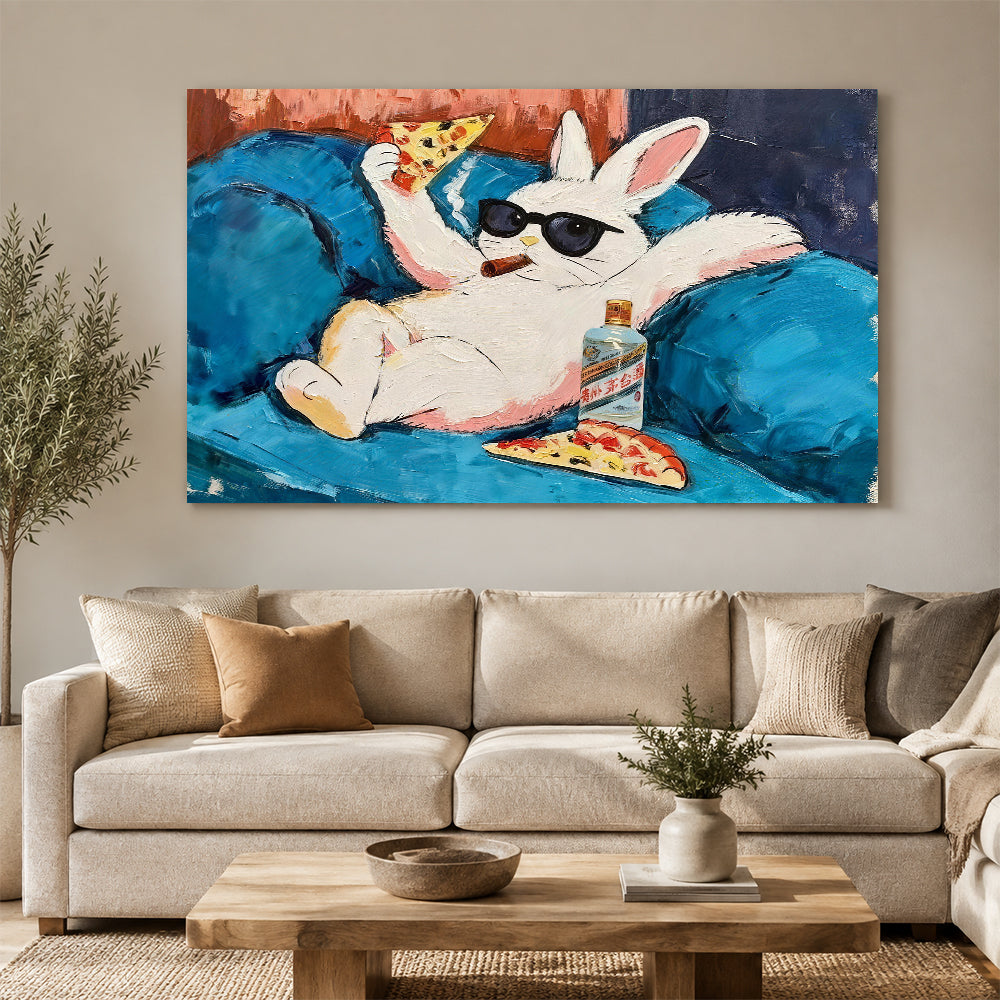 Rabbit Relaxing on a Blue Sofa canvas wall art, styled room mockup 1.