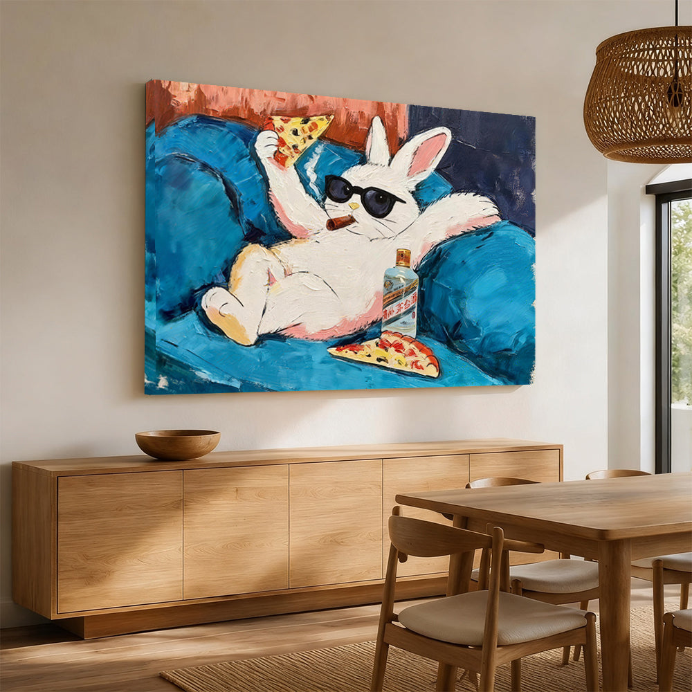 Rabbit Relaxing on a Blue Sofa canvas wall art, styled room mockup 3.