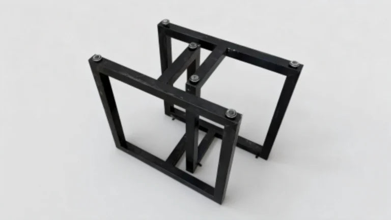 Close view of feet attached to the metal table legs